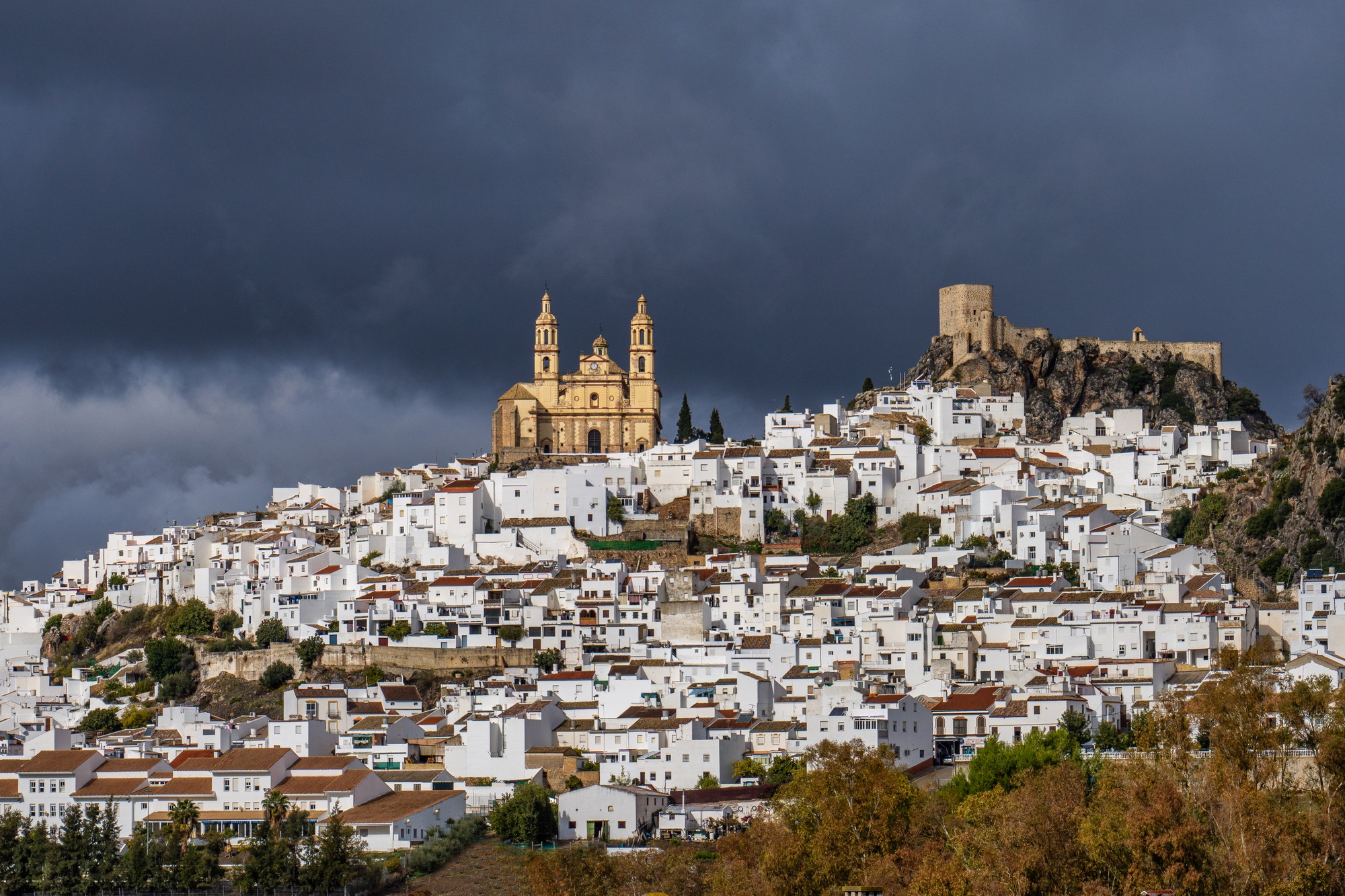Olvera is a white village, pueblo blanco in Cadiz province, Andalusia, Spain Olvera is a white village, pueblo blanco in Cadiz province, Andalusia, Spain. It features a moorish fortress and a neoclassic cathedral overlooking the whitewashed village.